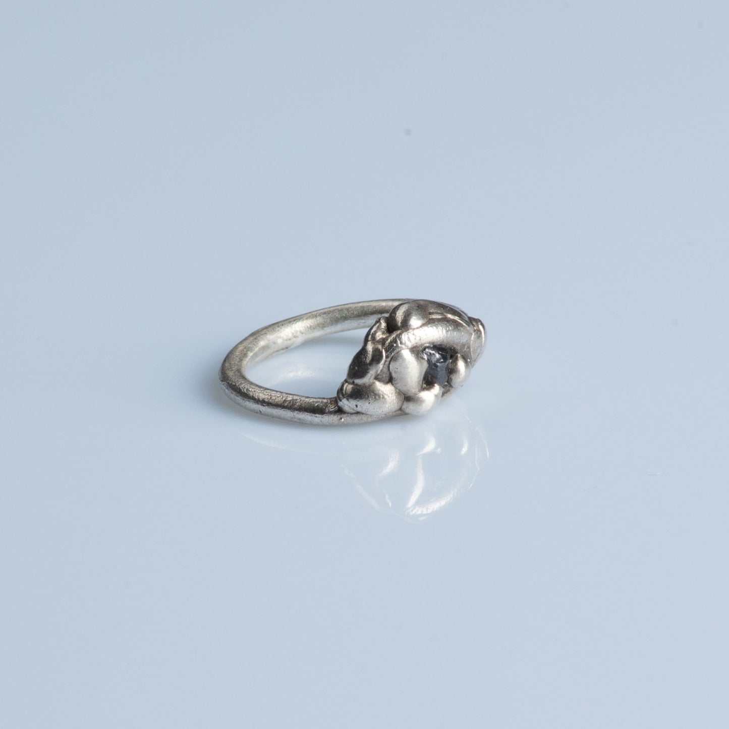 Sterling Silver Ring with Raw Sapphire "Cold Embrace"